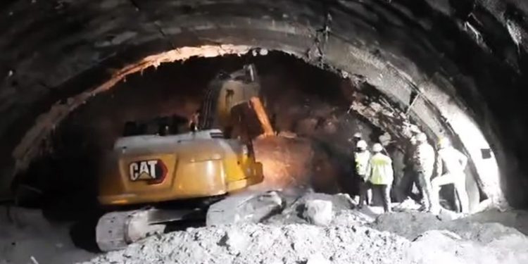 Rescuers scramble to reach up to 40 workers trapped in Himalayan tunnel collapse