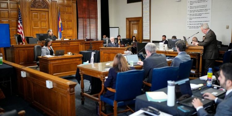 Colorado judge rules Trump can be on ballot but says he ‘engaged’ in insurrection