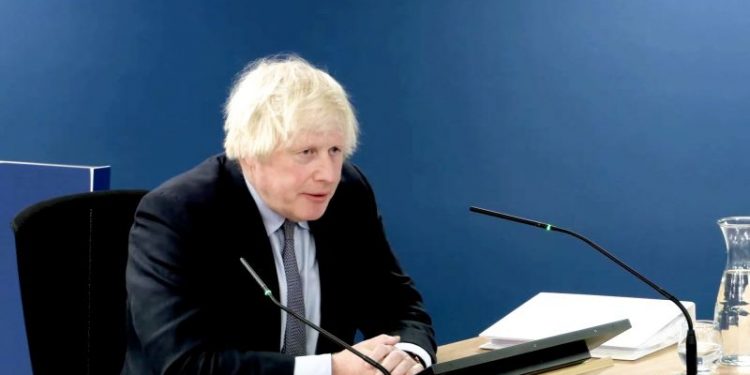 ‘The dead can’t hear your apologies:’ Boris Johnson heckled as he attempts to say sorry for Covid deaths