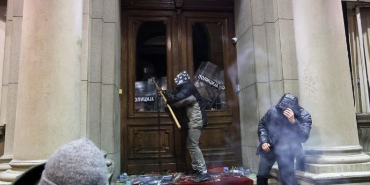 Demonstrators try to storm Belgrade city hall in protest against ‘stolen’ Serbian elections