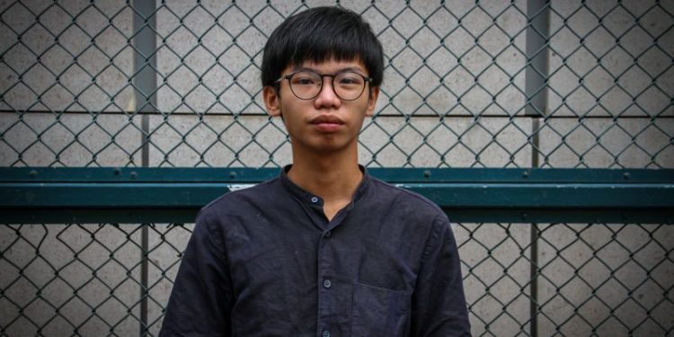 Hong Kong activist flees to UK citing ‘stringent surveillance’ by national security police following his prison release