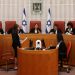 Israel’s top court strikes down key part of judicial overhaul, in ruling that could reignite divisions as war rages