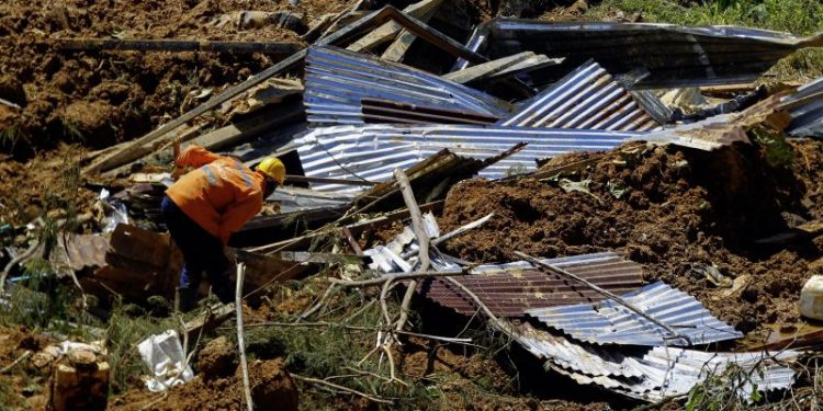 At least 34 dead in Colombia landslides