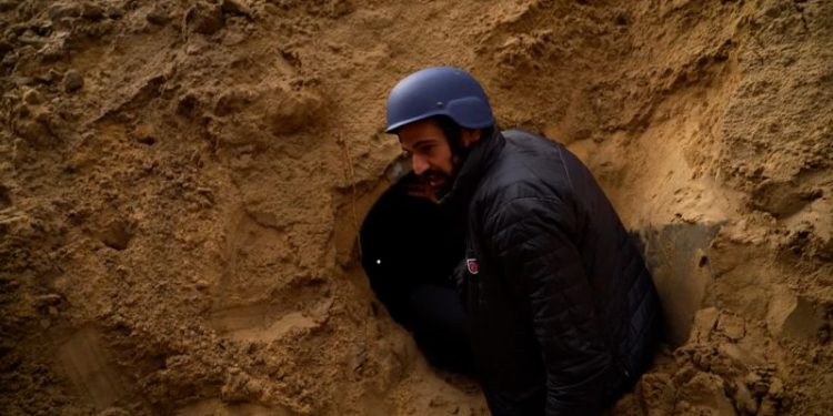 Israel claims a tunnel ran through this Gaza cemetery it destroyed. A visit to the site raised more questions than answers