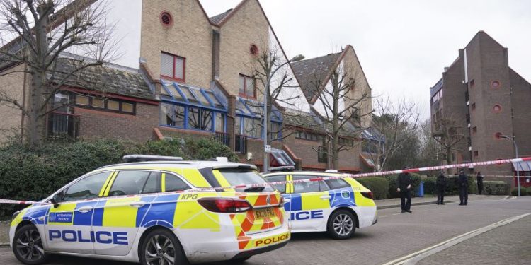 London police shoot dead man allegedly armed with crossbow