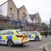 London police shoot dead man allegedly armed with crossbow