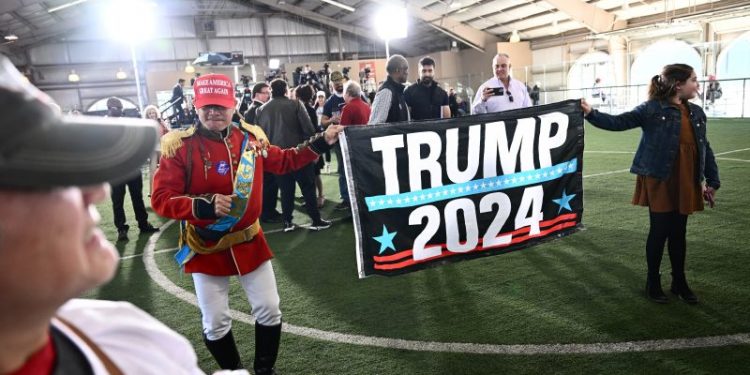 Trump campaigns in Nevada, where he is all but guaranteed victory