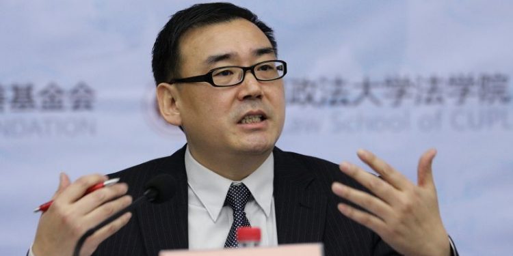 China hands Australian writer a suspended death penalty in a move Canberra condemns