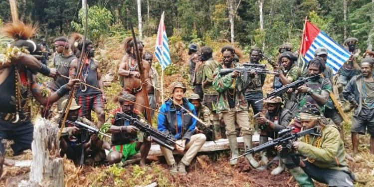 Militants squabble over fate of New Zealand pilot on anniversary of his kidnapping