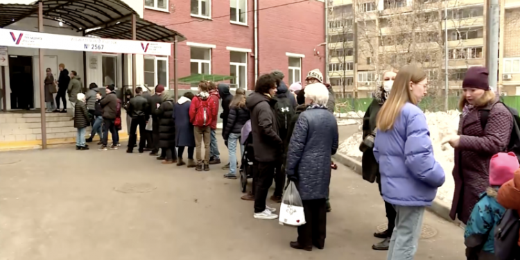 Russia sees polling station protests as Putin set to extend long rule