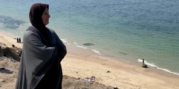 An elderly Palestinian woman fled her home in northern Gaza. Now she is fighting to keep her grandchildren alive