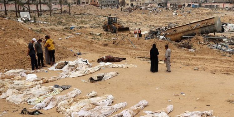 Almost 400 bodies have been found in mass grave in Gaza hospital, says Palestinian Civil Defense