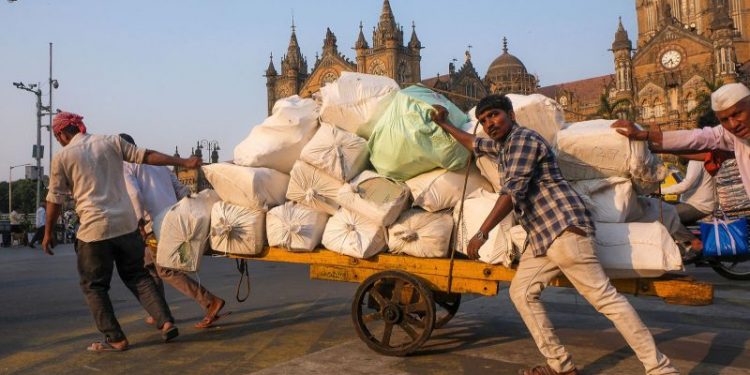 In the world’s biggest election, millions of migrants are unable to vote