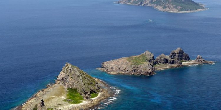 Chinese ships spend record amount of time near Japan-controlled islands, Tokyo says
