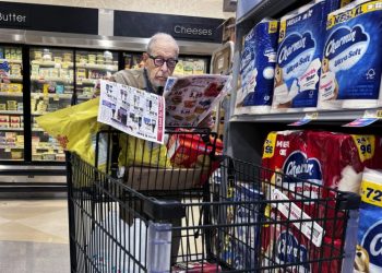 Inflation pressure lingering from pandemic is keeping Fed rate cuts on pause