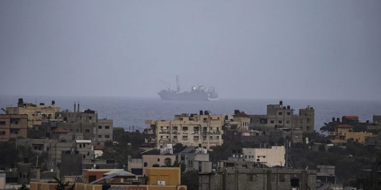 U.S. military anchors floating pier to Gaza, set to begin aid effort