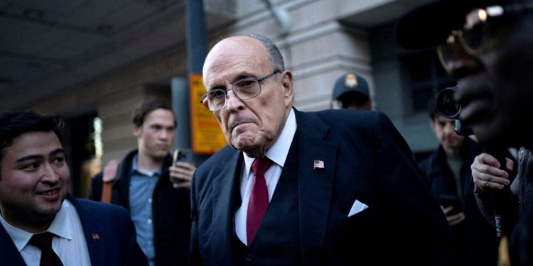 Giuliani says he will stop accusing Georgia workers of election tampering