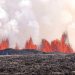 Iceland volcano dramatically erupts again as streams of lava reach town’s defensive walls