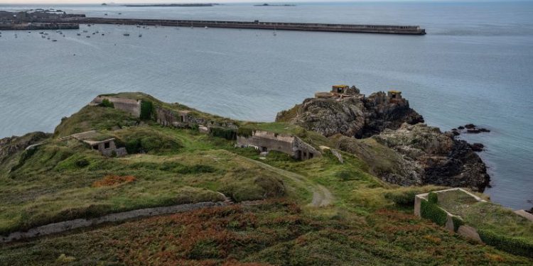 This quiet British island was once the site of Nazi atrocities. A new inquiry reveals its truths