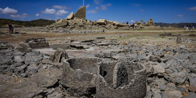 A 300-year-old settlement resurfaces as severe drought dries up a dam in the Philippines