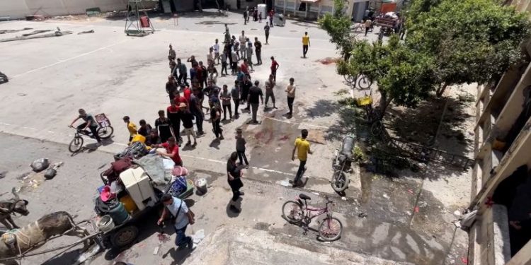 At least 10 people killed in drone attack on Gaza school used as shelter