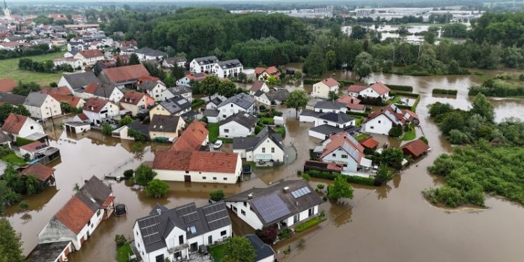 Rescue worker dies, several thousand evacuated in southern Germany floods