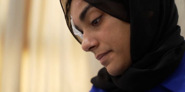 She managed to flee Gaza after half her family was killed in an Israeli strike. She blames Israel and Hamas for what happened