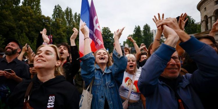 French left-wing coalition projected to beat the far right in surprise second-round result