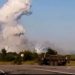 Russia vows to respond after Ukrainian drone attack sets on fire alleged munitions warehouse