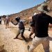 Israeli settlers attack foreign activists and Palestinian farmers in West Bank