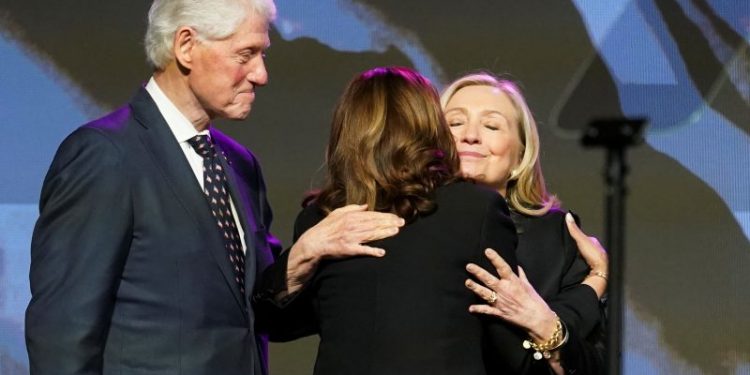 Hillary Clinton returns to DNC convention as reminder of ‘unfinished business’