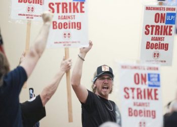Boeing factory workers strike after overwhelmingly rejecting contract
