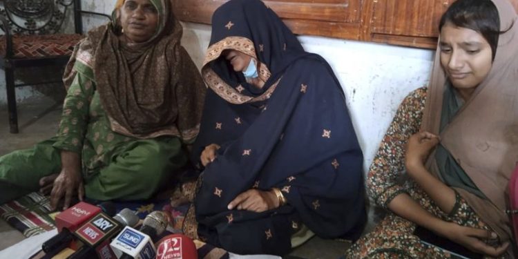 Pakistan says police responsible for killing a doctor accused of blasphemy