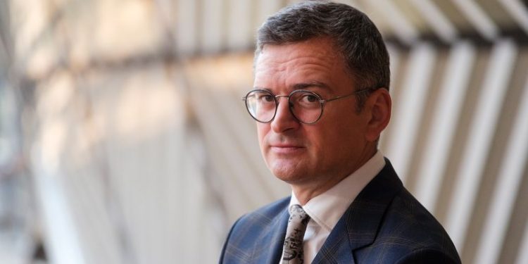 Ukraine’s FM tenders resignation ahead of expected cabinet reshuffle as new wave of Russian missiles kill at least 7