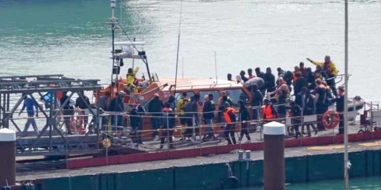 At least 12 dead after boat carrying migrants sinks in the English Channel