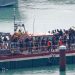 At least 12 dead after boat carrying migrants sinks in the English Channel