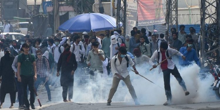 Pakistani police fire tear gas at protesting students as anger spreads over alleged on-campus rape