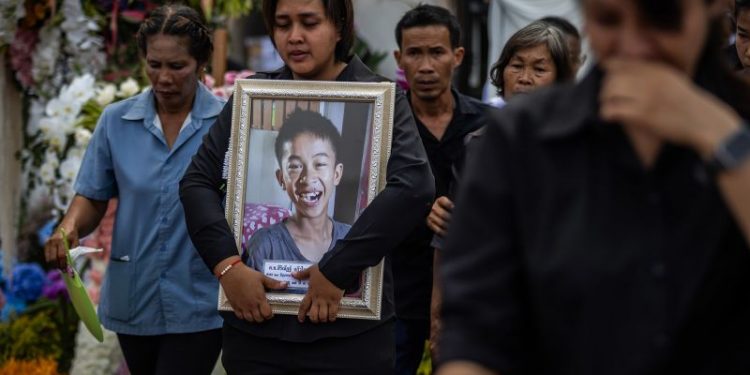Small town in Thailand holds mass cremation for 23 who died in a school trip bus fire