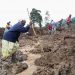 At least 15 killed and more than 100 missing after landslides bury homes in Uganda
