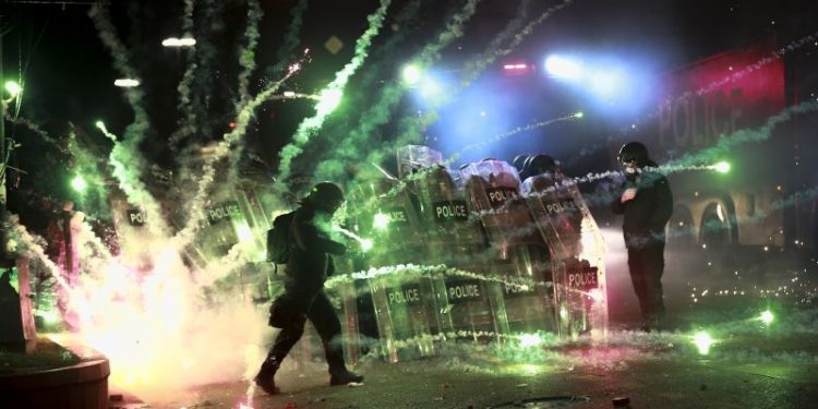 Protesters gather for third night of demonstrations after Georgia announces suspension of EU talks