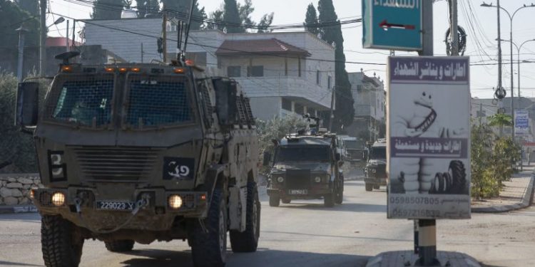 Israeli attacks in West Bank killed at least eight people, officials and residents say