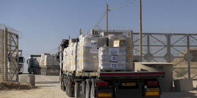 Nearly a hundred aid trucks looted in Gaza, as UN warns of ‘collapse of law and order’