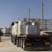 Nearly a hundred aid trucks looted in Gaza, as UN warns of ‘collapse of law and order’