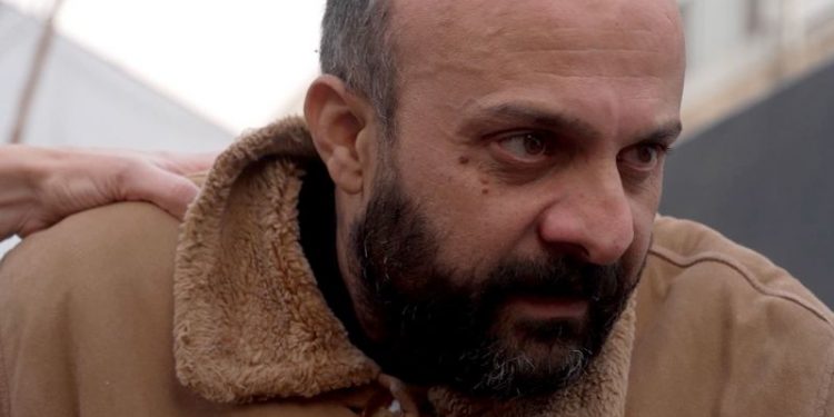 Freed prisoner who said he was a victim of the Assad regime was an intelligence officer, locals say