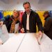 Romanians vote in parliamentary election amid turmoil over claims of Russian interference in presidential race