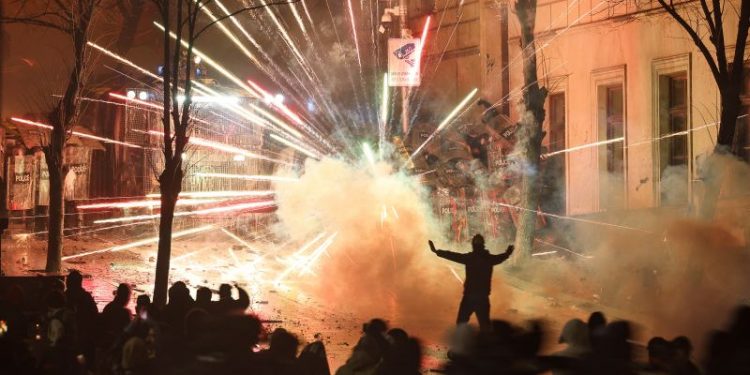 Protests in Georgia spread as PM defies US condemnation