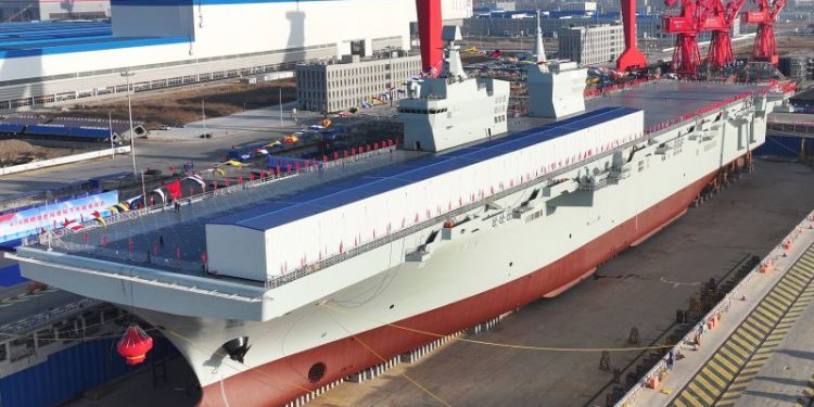 China launches new amphibious assault ship in a race to rival US military
