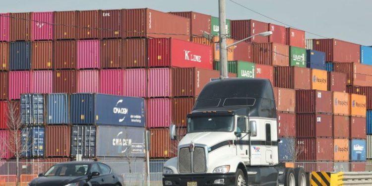 Potentially crippling port strike averted after dockworkers, ports and shipping companies reach a tentative deal