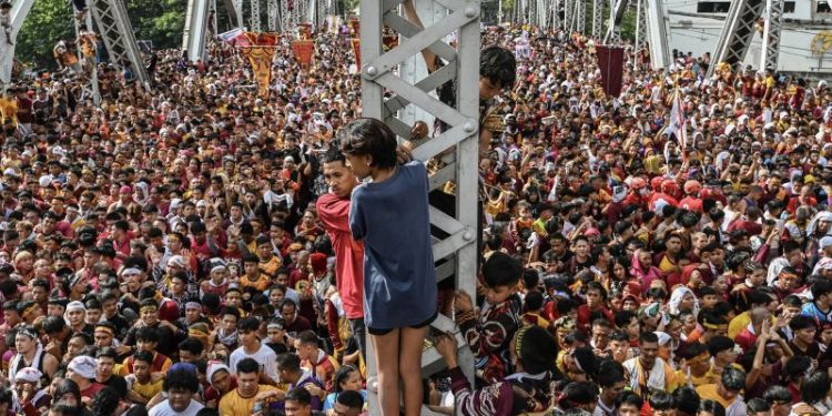 Philippines’ Black Nazarene procession draws hundreds of thousands of devotees