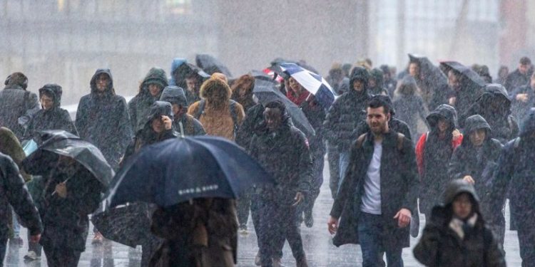 Severe storm lashes parts of UK and Ireland, causing travel chaos